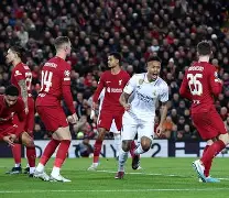 马德里竞技客场不敌利物浦，小组赛出线形势严峻